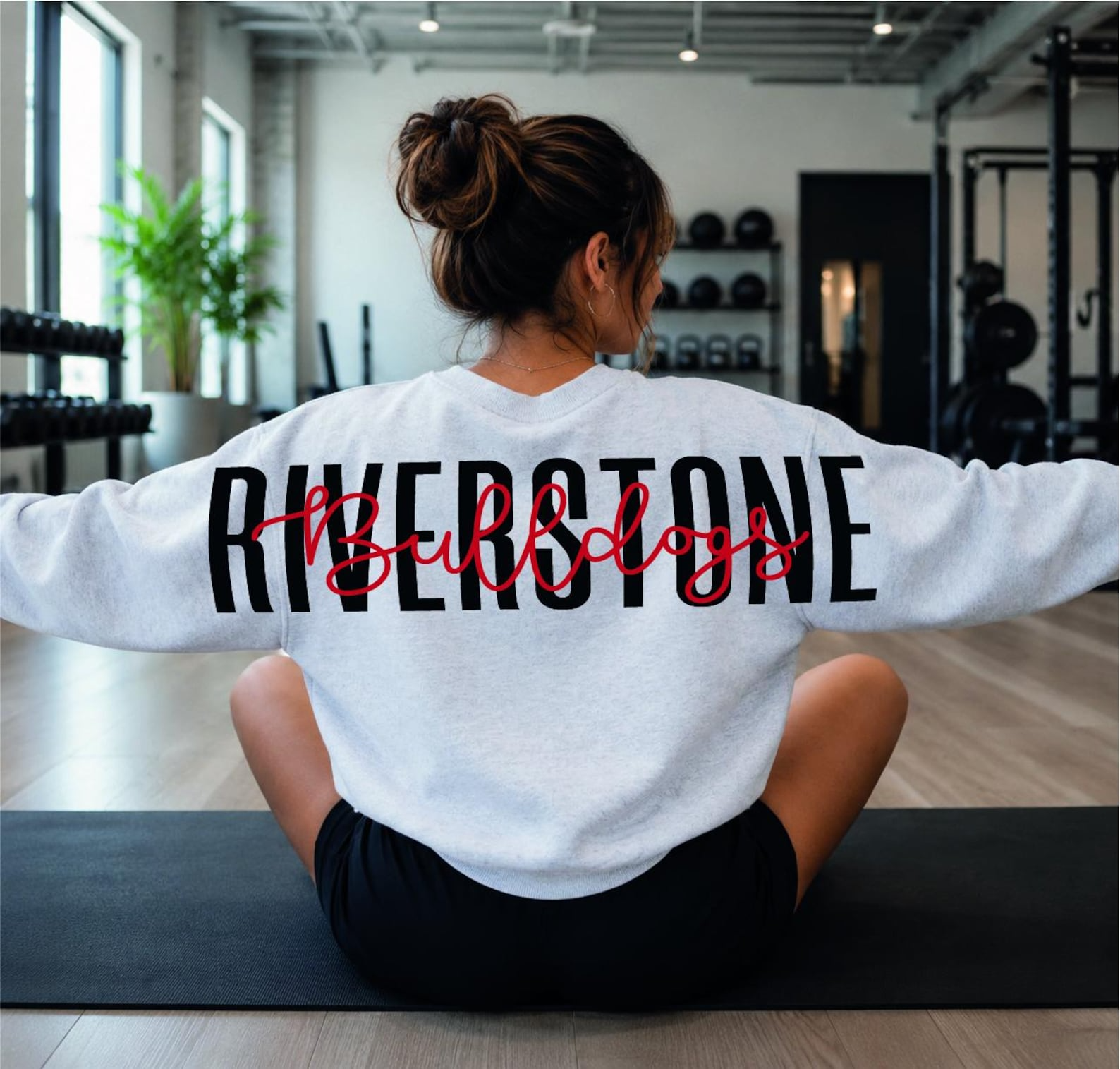 May_include_A_light_gray_crewneck_sweatshirt_featuring_the_word_RIVERSTONE_in_large_black_capital_le_06-32-48-391Z
